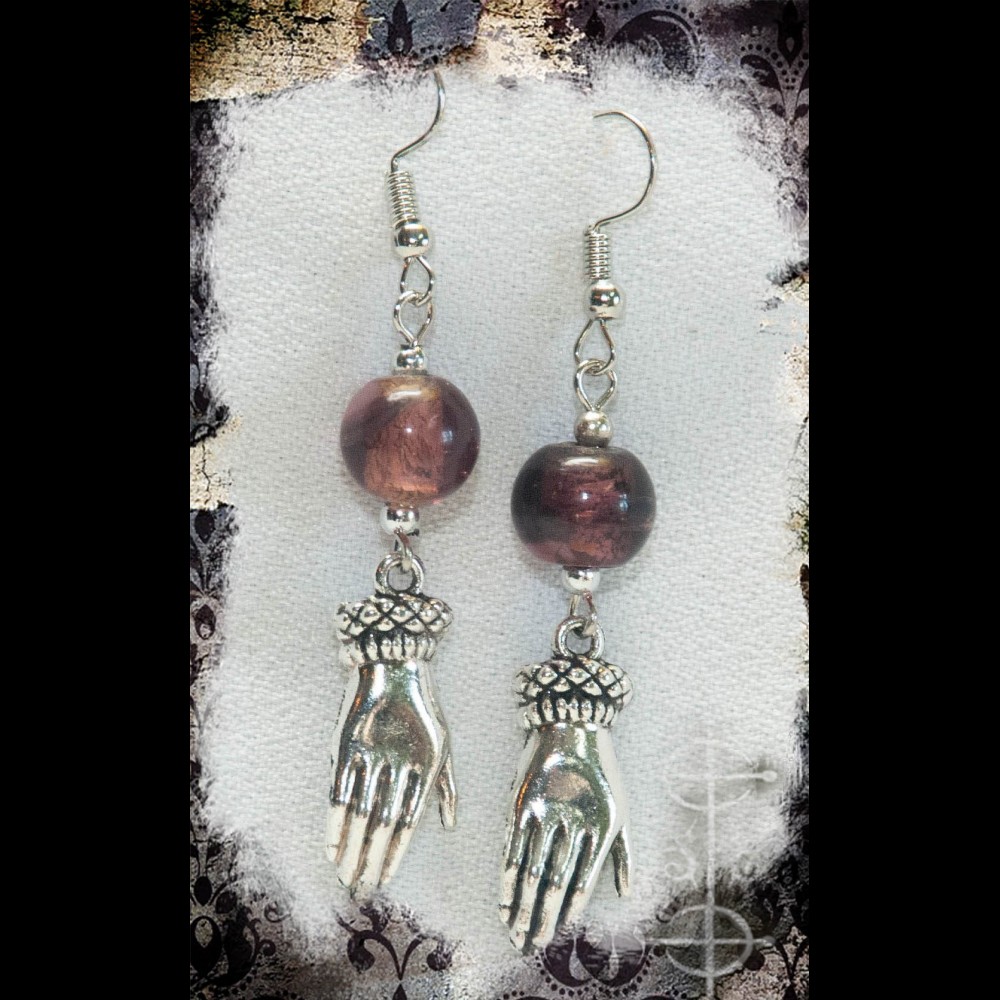 Boucles d'oreilles main mauve