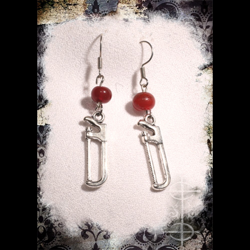 Boucles d'oreilles scie d"emputation